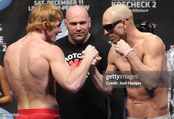 Welterweight opponents Matthew Riddle and Sean Pierson face off as UFC President Dana White looks at the UFC 124 Weigh-in at the Bell Centre on...