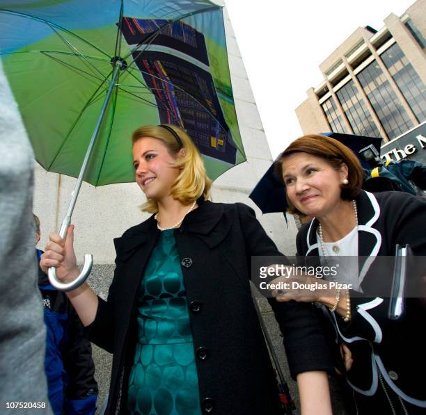 Elizabeth Smart , and her mother Lois walk through the media outside federal court after the verdict in the Brian David Mitchell trial on December...