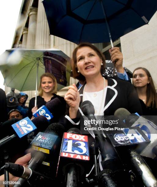 Lois Smart, mother of Elizabeth Smart, rear left, makes a statement to the media outside federal court after the verdict in the Brian David Mitchell...