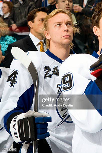 Johan Harju of the Tampa Bay Lightning stands for the national anthems before a game against the Edmonton Oilers at Rexall Place on December 10, 2010...