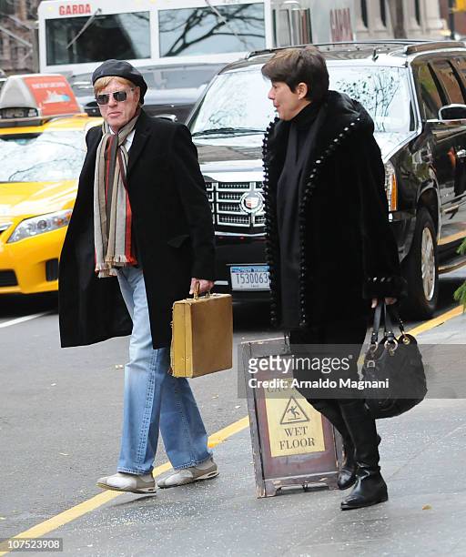 Actor Robert Redford and his wife Lola Redford are seen December 10, 2010 in New York City.