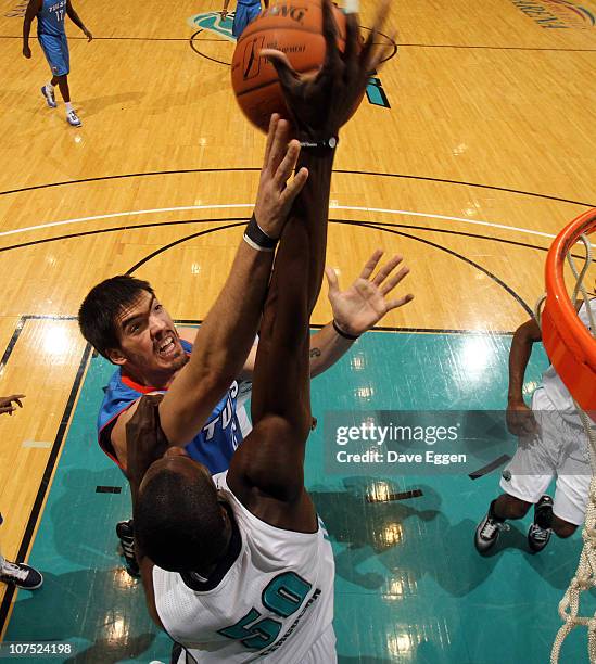 Byron Mullens of the Tulsa 66ers has his shot blocked by Anwar Ferguson of the Sioux Falls Skyforce in the first half of their game December 10, 2010...