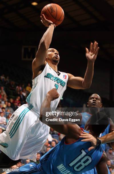 Anthony Harris of the Sioux Falls Skyforce is called for the offensive foul as he drives into Elijah Millsap of the Tulsa 66ers in the first half of...
