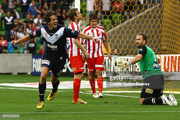 Robbie Kruse of the Victory celebrates scoring a goal during the round 18 A-League match between the Melbourne Heart and Melbourne Victory at AAMI...