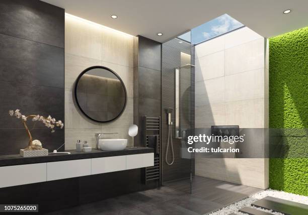 luxury bathroom with innovative green moss wall and a skylight - limestone stock pictures, royalty-free photos & images