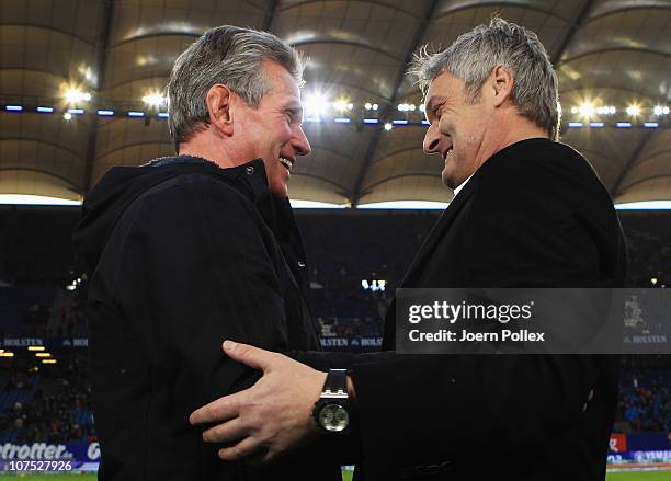 Head coach Jupp Heynckes of Leverkusen and head coach Armin Veh of Hamburg chat prior to the Bundesliga match between Hamburger SV and Bayer...