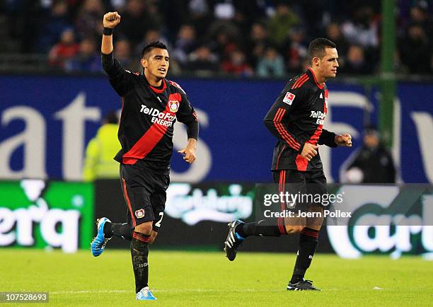 Arturo Vidal of Leverkusen celebrates after scoring his team's second goal during the Bundesliga match between Hamburger SV and Bayer Leverkusen at...