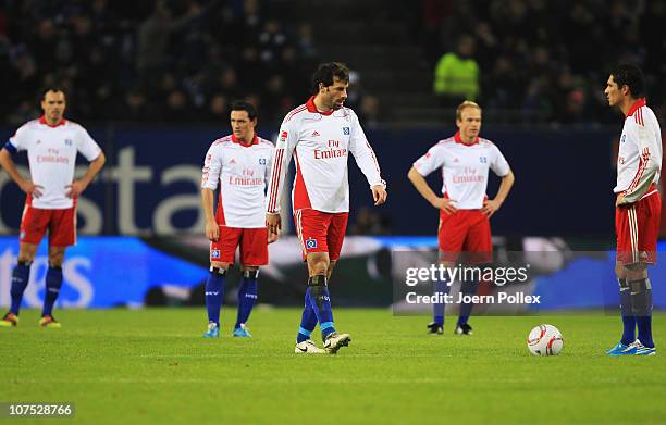 Player of Hamburg are seen after Leverkusens third goal during the Bundesliga match between Hamburger SV and Bayer Leverkusen at Imtech Arena on...