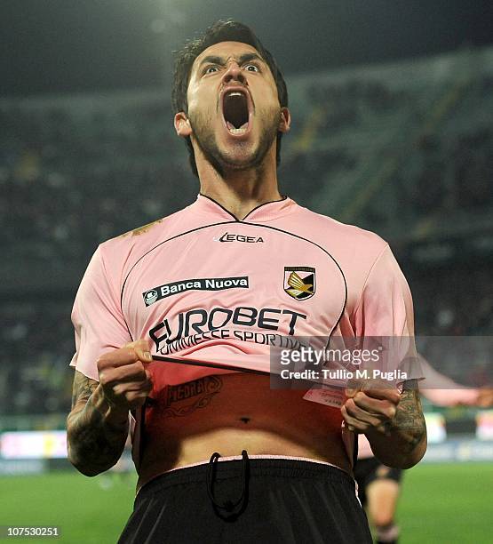 Mauricio Pinilla of Palermo celebrates after scoring the first equalizing goal during the Serie A match between Palermo and Parma at Stadio Renzo...