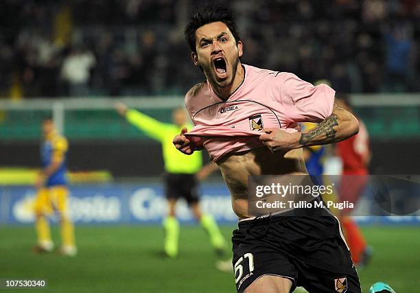 Mauricio Pinilla of Palermo celebrates after scoring the equalizing goal during the Serie A match between Palermo and Parma at Stadio Renzo Barbera...