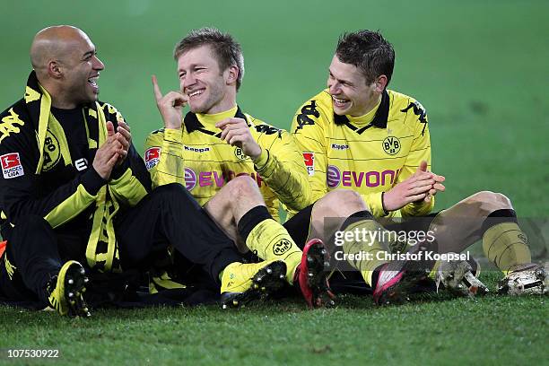 Dede, Jakub Blaszczykowski and Lukasz Piszczek of Dortmund celebrate the 2-0 victory after the Bundesliga match between Borussia Dortmund and Werder...