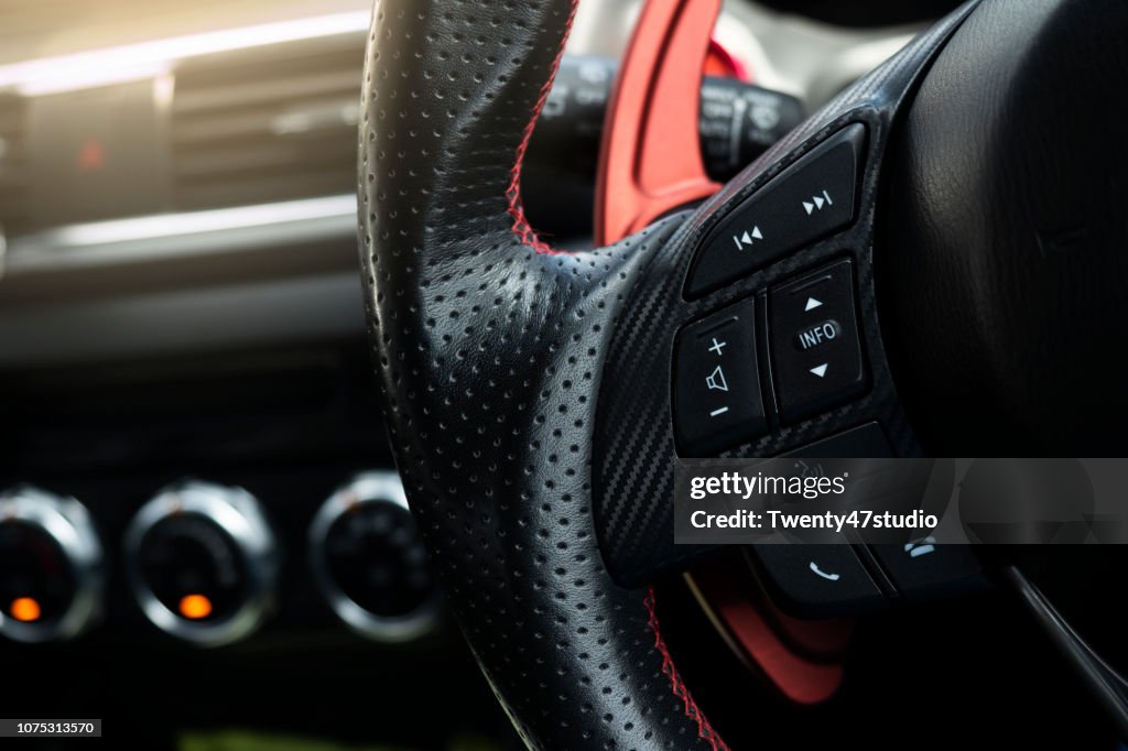 Steering wheel. Multi function buttons on steering wheel in car