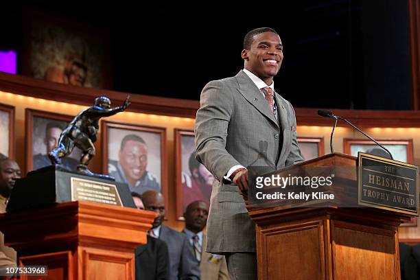 Quarterback Cam Newton of the Auburn University Tigers speaks after being named the 76th Heisman Memorial Trophy Award winner at the Best Buy Theater...