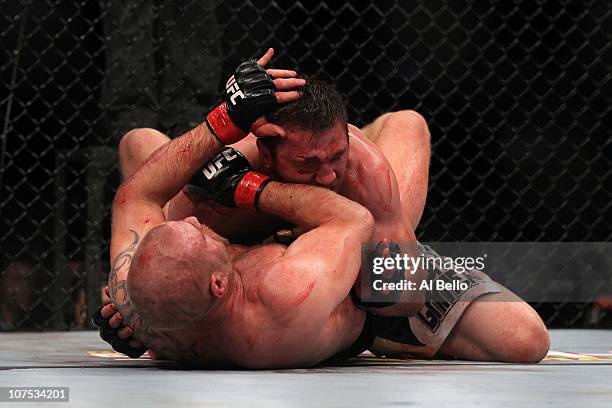 Dan Miller fights against Joe Doerksen during their Middleweight bout during UFC 124 at the Centre Bell on December 11, 2010 in Montreal, Quebec,...