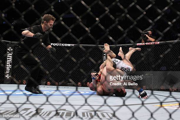 Dan Miller fights against Joe Doerksen during their Middleweight bout during UFC 124 at the Centre Bell on December 11, 2010 in Montreal, Quebec,...