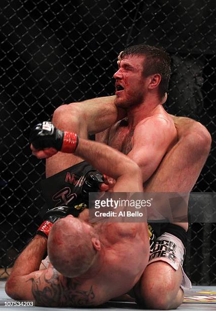Dan Miller fights against Joe Doerksen during their Middleweight bout during UFC 124 at the Centre Bell on December 11, 2010 in Montreal, Quebec,...