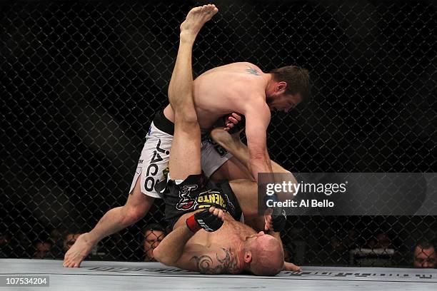 Dan Miller fights against Joe Doerksen during their Middleweight bout during UFC 124 at the Centre Bell on December 11, 2010 in Montreal, Quebec,...