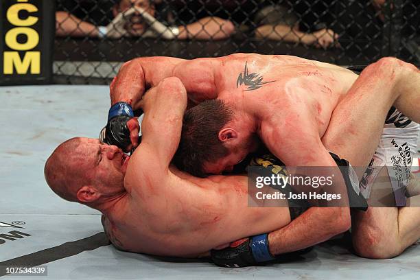 Dan Miller fights against Joe Doerksen during their Middleweight bout during UFC 124 at the Centre Bell on December 11, 2010 in Montreal, Quebec,...