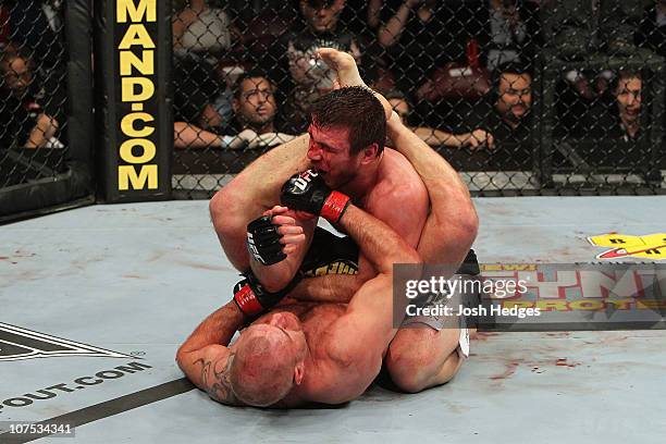 Dan Miller fights against Joe Doerksen during their Middleweight bout during UFC 124 at the Centre Bell on December 11, 2010 in Montreal, Quebec,...