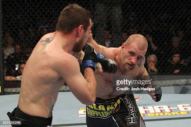 Joe Doerksen throws a punch against Dan Miller during their Middleweight bout during UFC 124 at the Centre Bell on December 11, 2010 in Montreal,...