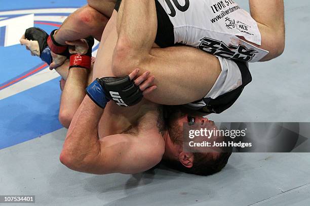 Dan Miller fights against Joe Doerksen during their Middleweight bout during UFC 124 at the Centre Bell on December 11, 2010 in Montreal, Quebec,...