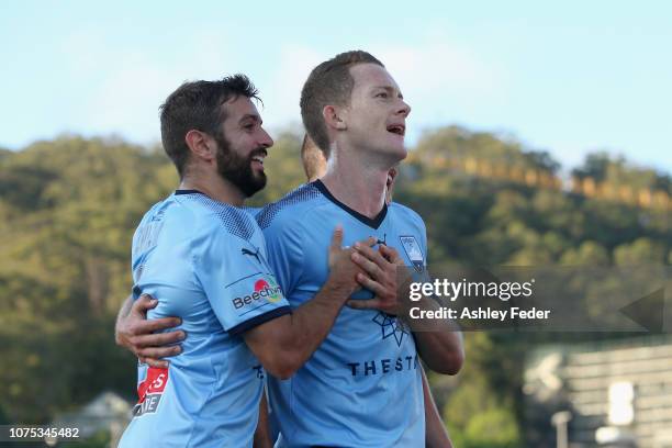 Brandon O'Neill of Sydney FC celebrates his goal with team mates Joshua Brillante and during the round six A-League match between the Central Coast...