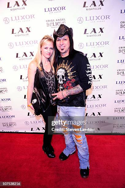 Artist Michael Gader and guest arrive for Criss Angel's birthday and 1000th 'Criss Angel BeLIEve' show at LAX Nightclub on December 11, 2010 in Las...