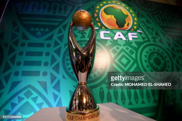 This picture shows the trophy prior to the draw of the Confederation of African Football's Champions league at the Ritz Carlton Hotel in Cairo on...