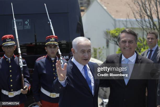 Jair Bolsonaro, Brazil's president-elect, right, and Benjamin Netanyahu, Israel's prime minister, stand for a photograph at Fort Copacabana in Rio de...