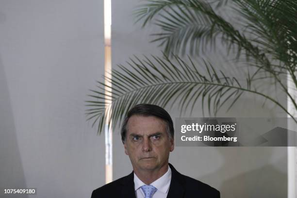 Jair Bolsonaro, Brazil's president-elect, listens during a press conference with Benjamin Netanyahu, Israel's prime minister, not pictured, at Fort...