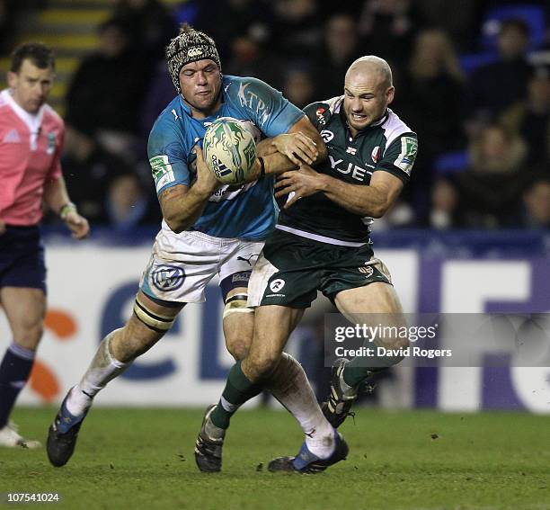 Joe van Niekerk of Toulon is challenged by Paul Hodgson to the loose ball during the Heineken Cup Pool 3 match between London Irish and Toulon at...