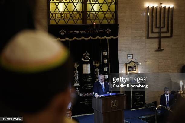 Benjamin Netanyahu, Israel's prime minister, speaks during an event at a synagogue with Jair Bolsonaro, Brazil's president-elect, not pictured, in...
