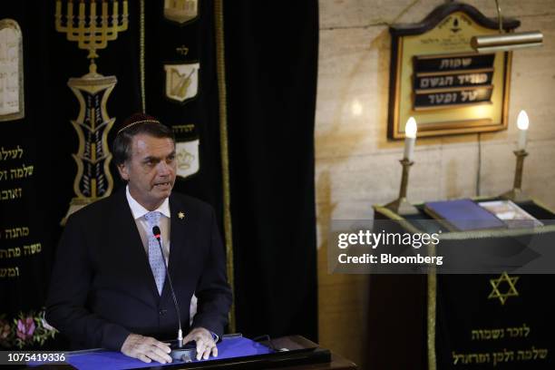 Jair Bolsonaro, Brazil's president-elect, speaks during an event at a synagogue with Benjamin Netanyahu, Israel's prime minister, not pictured, in...