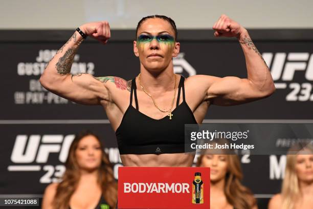 Cris Cyborg of Brazil poses on the scale during the UFC 232 weigh-in inside The Forum on December 28, 2018 in Inglewood, California.