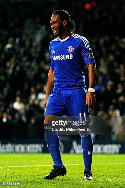 Didier Drogba of Chelsea reacts after taking a penalty kick, which is saved by Spurs Goalkeeper Heurelho Gomes during the Barclays Premier League...