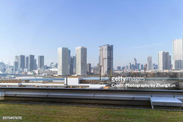 panorama view of tokyo toyosu cityscape, skyscrapers skyline image, at day time autumn, japan. - toyosu stock-fotos und bilder
