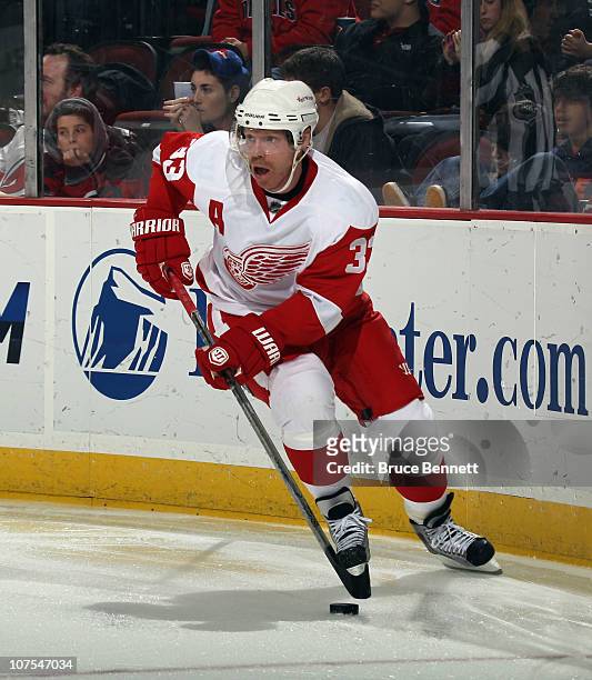 Kris Draper of the Detroit Red Wings skates against the New Jersey Devils at the Prudential Center on December 11, 2010 in Newark, New Jersey. The...
