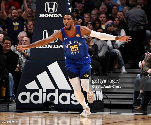 Denver Nuggets guard Malik Beasley celebrates after a slam dunk over the San Antonio Spurs in the first half at the Pepsi Center December 28, 2018.