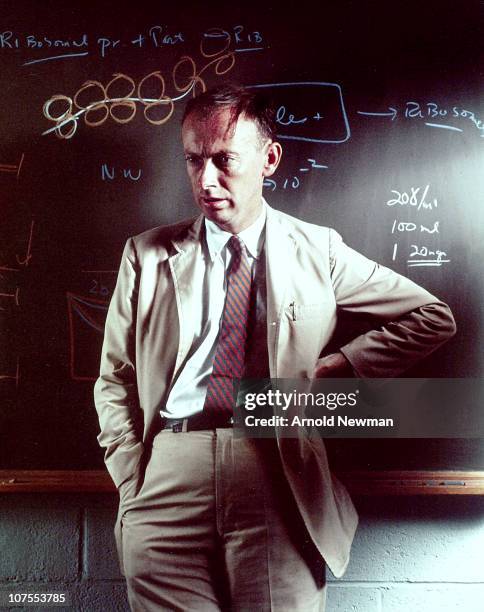 Portrait of Nobel prize winning scientist and researcher Dr James Watson, posing in front of a blackboard at Harvard University, in Cambridge, MA,...