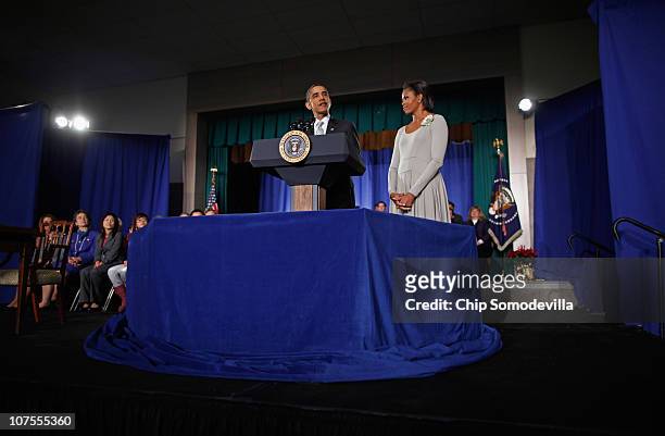 President Barack Obama and first lady Michelle Obama deliver remarks before the president signs the Healthy, Hunger-Free Kids Act of 2010 at Harriet...