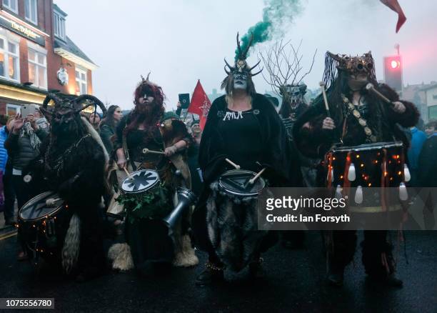 Drummers accompany participants as they parade through the streets during the annual Whitby Krampus parade on December 01, 2018 in Whitby, England....