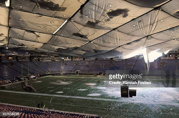 Torn section of the roof sags inside the Hubert H. Humphrey Metrodome on December 13, 2010 in Minneapolis, Minnesota. The Metrodome's roof collapsed...