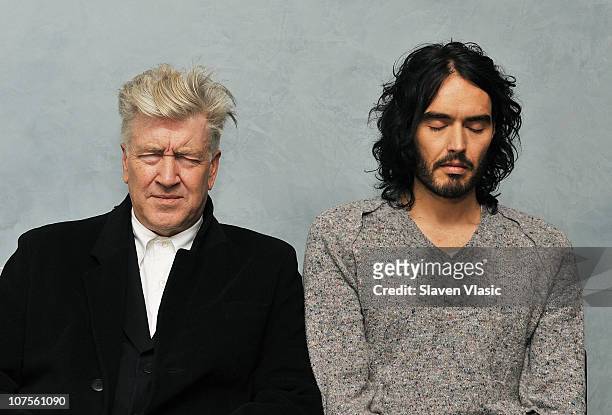 Director/philanthropist David Lynch and actor/comedian Russell Brand meditate at The Paley Center for Media on December 13, 2010 in New York City.