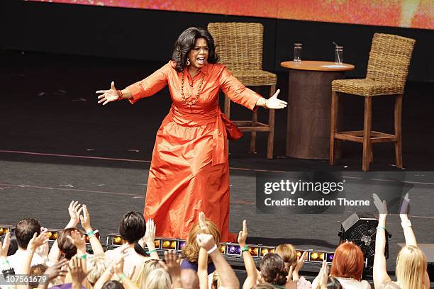 Oprah Winfrey gestures during the first taping of the "Oprah Winfrey Show" at the Sydney Opera House on December 14, 2010 in Sydney, Australia....