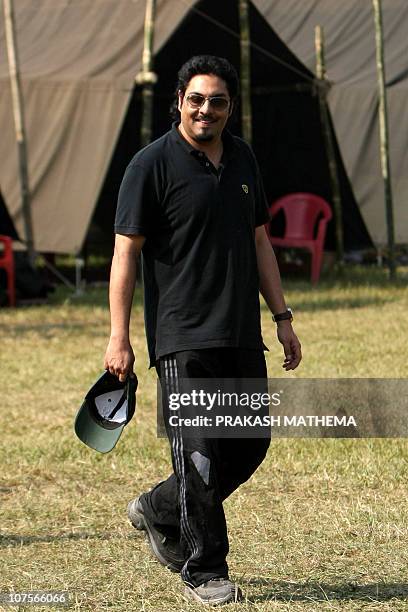 In this photo taken on December 2 Nepalese former crown prince Paras Shah walks while attending an elephant polo match at Meghauly in Chitwan...