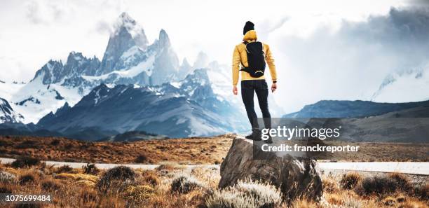 hiker man standing in el chalten - santa cruz province argentina stock pictures, royalty-free photos & images