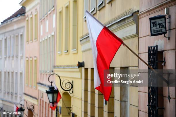 polish flags - poland stock pictures, royalty-free photos & images