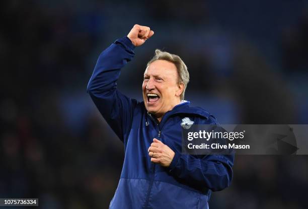 Neil Warnock, manager of Cardiff City celebrates during the Premier League match between Leicester City and Cardiff City at The King Power Stadium on...