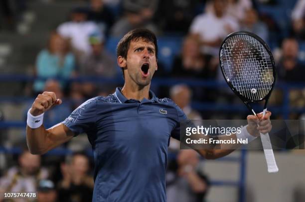 Novak Djokovic of Serbia celebartes against Kevin Anderson of South Africa during the men's final match of the Mubadala World Tennis Championship at...