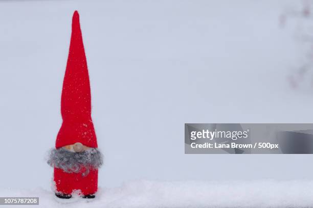 a gnome in the snow - snowboard jump close up stock pictures, royalty-free photos & images